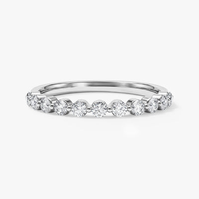 Ewigkeitsring mit Einzelkrappen-Fassung (0,35 CT TW, halb bestezt)