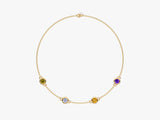 Gold chain necklace with four colorful gemstones
