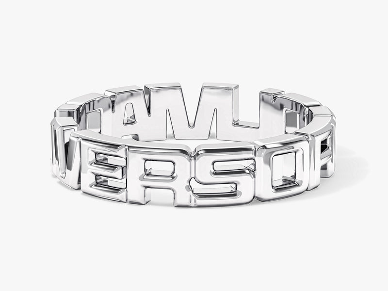 Silver ring with embossed "VERSO" text, jewelry design