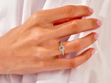 Diamond engagement ring on a woman's hand, jewelry