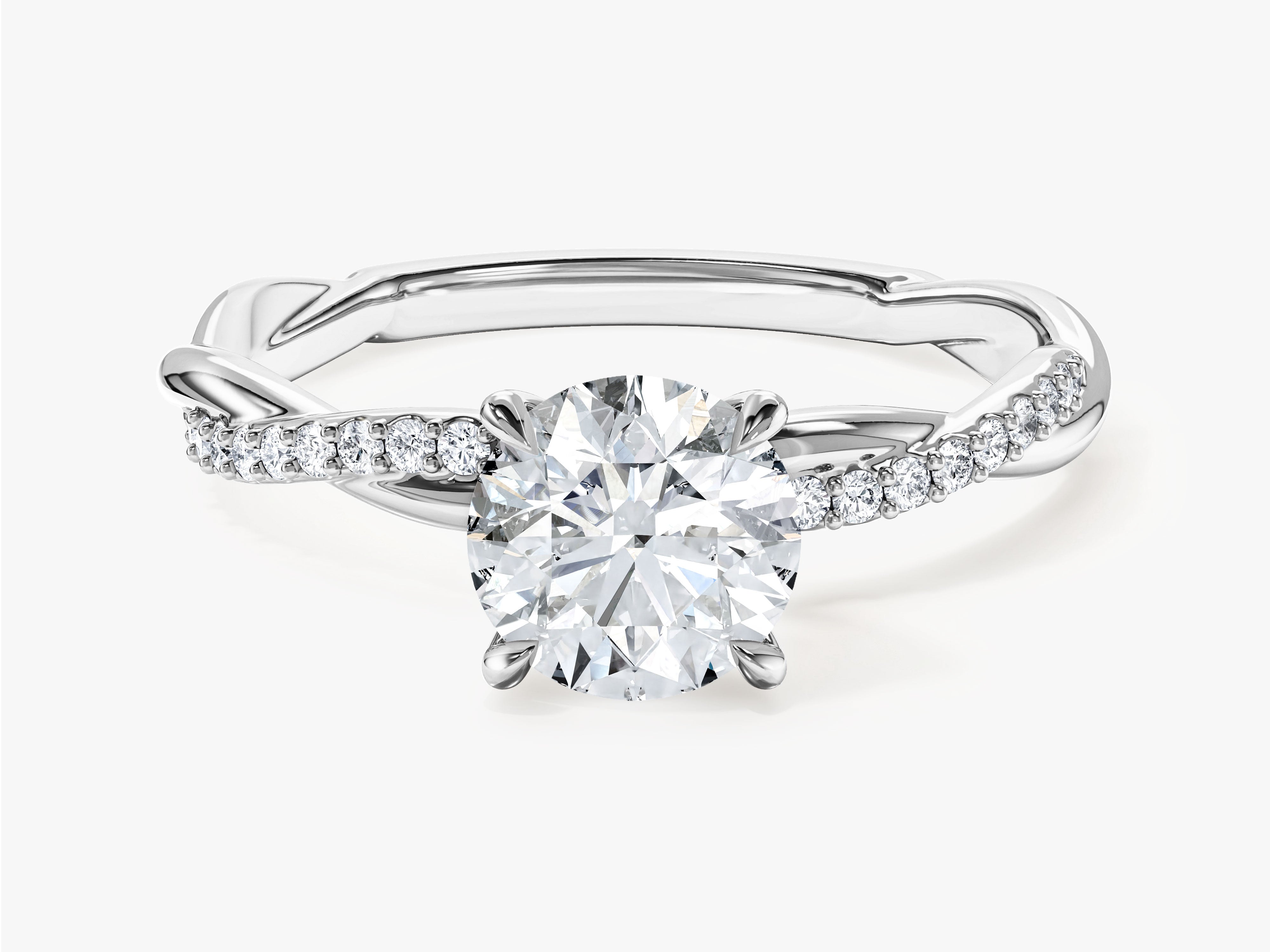 Twist Moissanit Verlobungsring im Rundschliff mit Seitensteinen (1,00 CT)