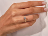 Diamond engagement ring on a woman's hand, fine jewelry