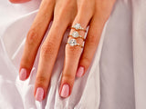 Diamond engagement rings on a hand, jewelry photography