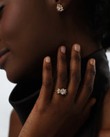 Marquise Cluster Accent Oval Cut Moissanite Engagement Ring (1.50 CT)