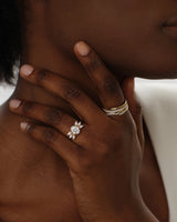 Marquise Cluster Accent Oval Cut Moissanite Engagement Ring (1.50 CT)