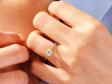 Diamond engagement ring on a woman's hand, jewelry product shot
