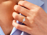 Diamond engagement ring on a woman's hand, jewelry