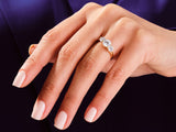 Diamond engagement ring on a woman's hand, jewelry photography