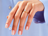 Diamond engagement ring on a woman's hand, jewelry