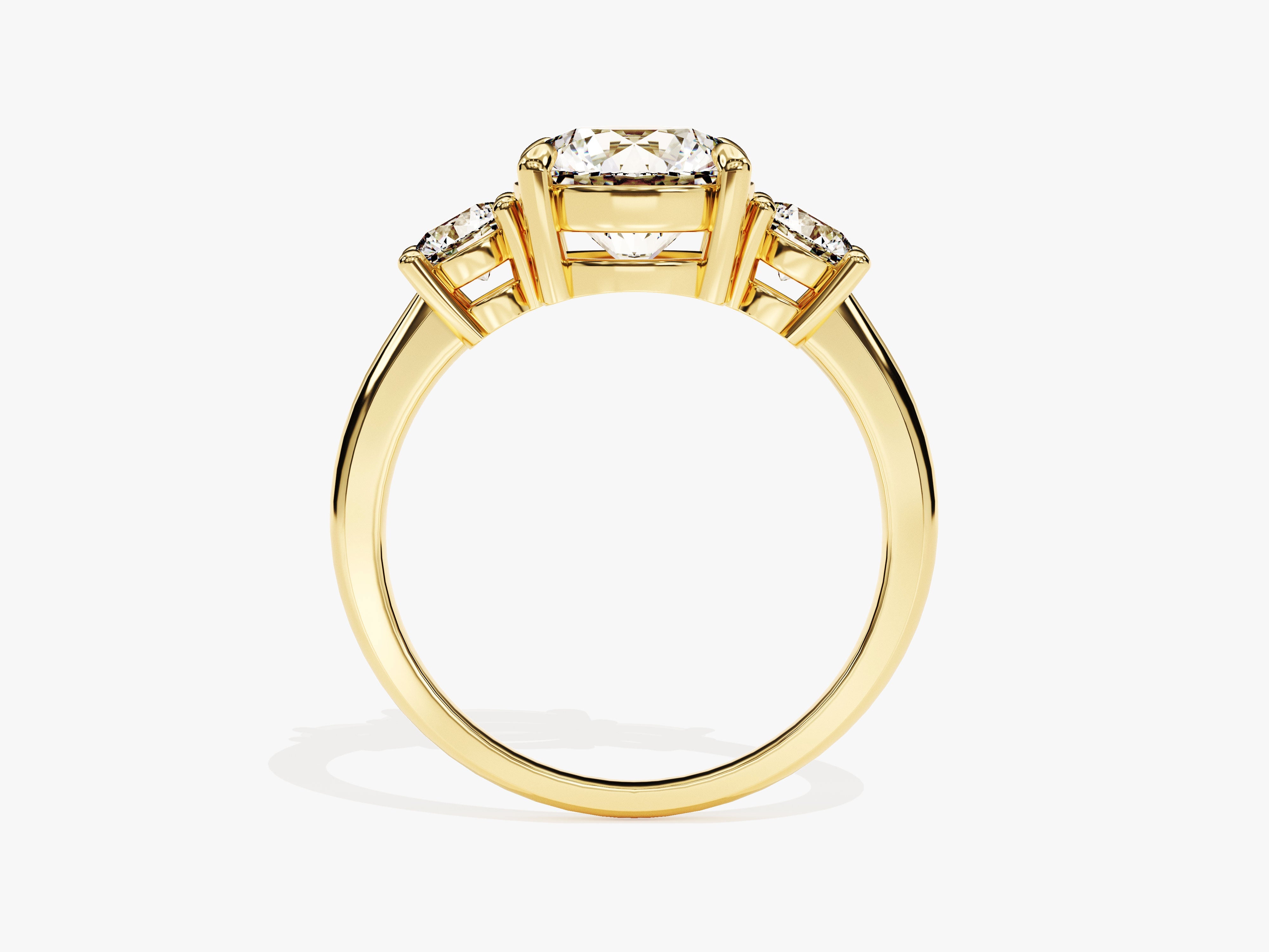Gold three-stone diamond engagement ring for jewelry company