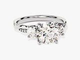 Diamond engagement ring with three stones and pave band