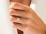 Diamond flower ring on hand, fine jewelry, elegant design