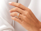 Diamond engagement ring on a woman's hand, jewelry photography