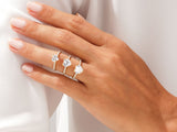Diamond heart rings on a hand, jewelry collection