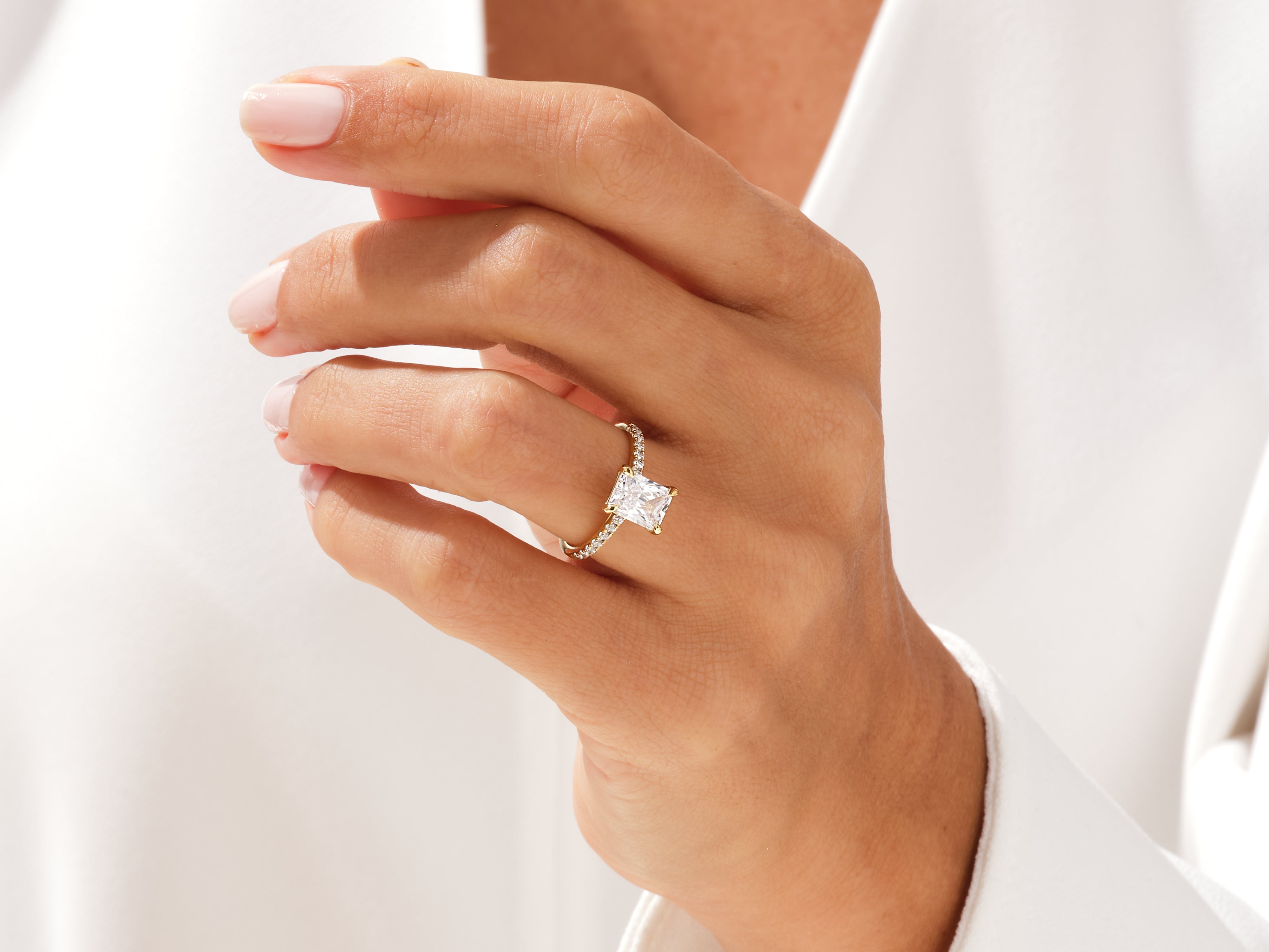 Diamond engagement ring on a woman's hand, jewelry