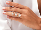 Diamond heart rings on a hand, jewelry collection