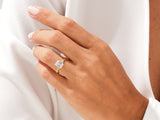 Emerald cut diamond ring with twisted gold band