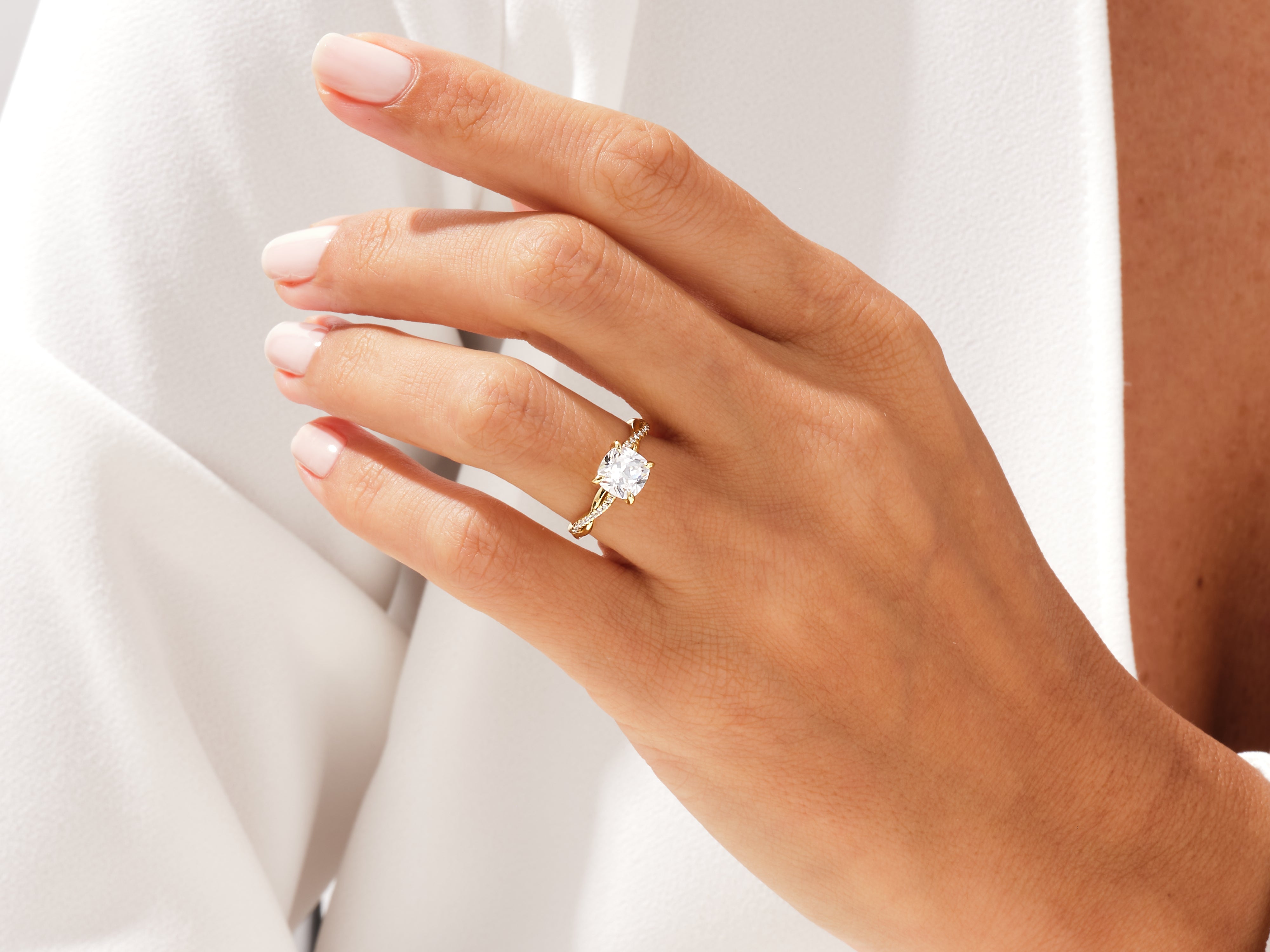 Diamond engagement ring on a woman's hand, jewelry product