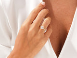Diamond engagement ring on a woman's hand, fine jewelry