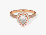Rose gold pear-shaped diamond engagement ring with halo