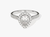 Diamond engagement ring with pear-shaped center stone and halo
