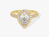 Gold pear cut diamond engagement ring with halo