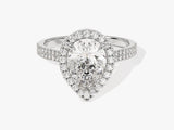 Diamond engagement ring with pear-shaped center stone and halo