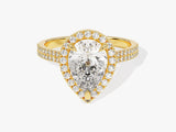 Gold pear-cut diamond halo engagement ring