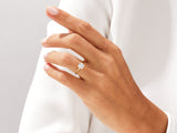 Diamond engagement ring on a woman's hand, fine jewelry