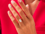 Marquise diamond engagement ring on hand, luxury jewelry