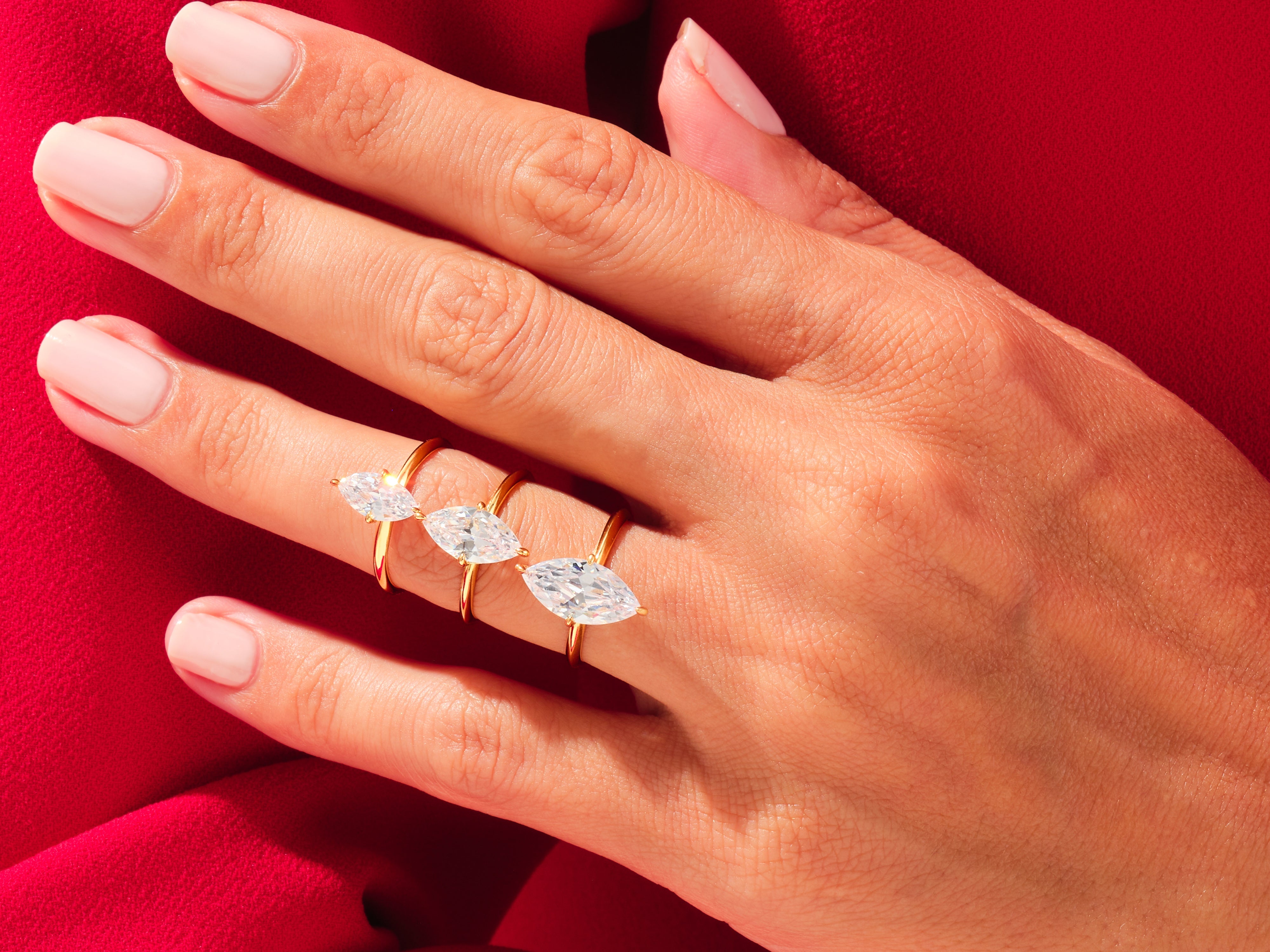Marquise diamond rings on a hand, luxury jewelry for women