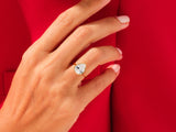 Pear-shaped diamond ring on a hand, luxury jewelry