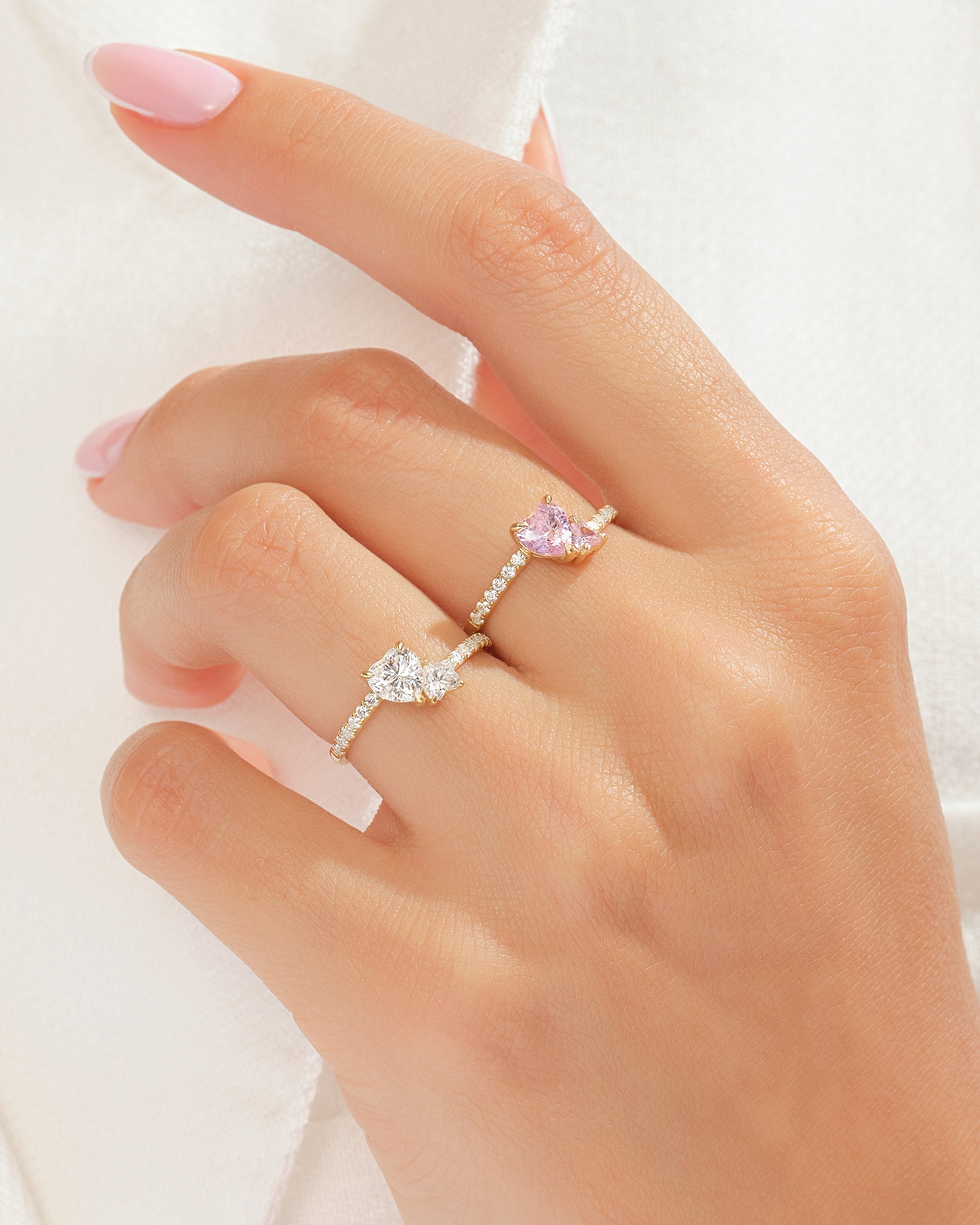 Pink Doppelherz Versprechensring mit Seitensteinen