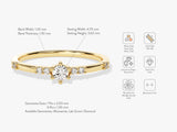 Gold ring with round cut diamond and side stones