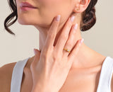 Gold diamond ring and lightning bolt earrings from jewelry brand