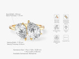 Two pear-shaped moissanite engagement ring in gold