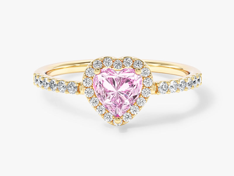 Gold ring with heart-shaped pink diamond and diamond halo