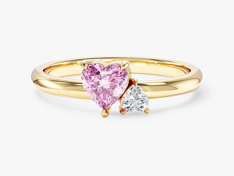Gold ring with heart-shaped pink and white diamonds