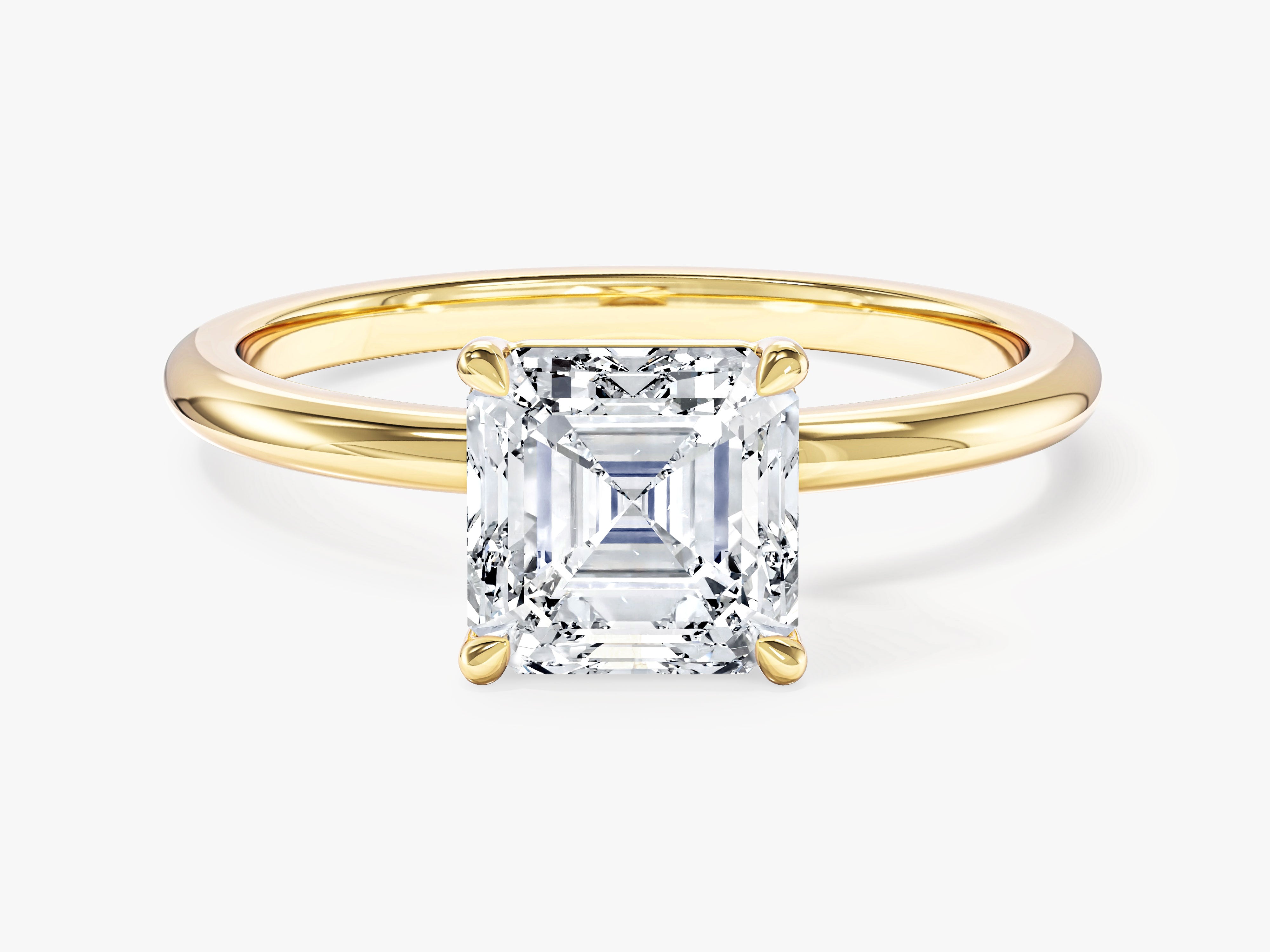 Asscher cut diamond engagement ring in yellow gold