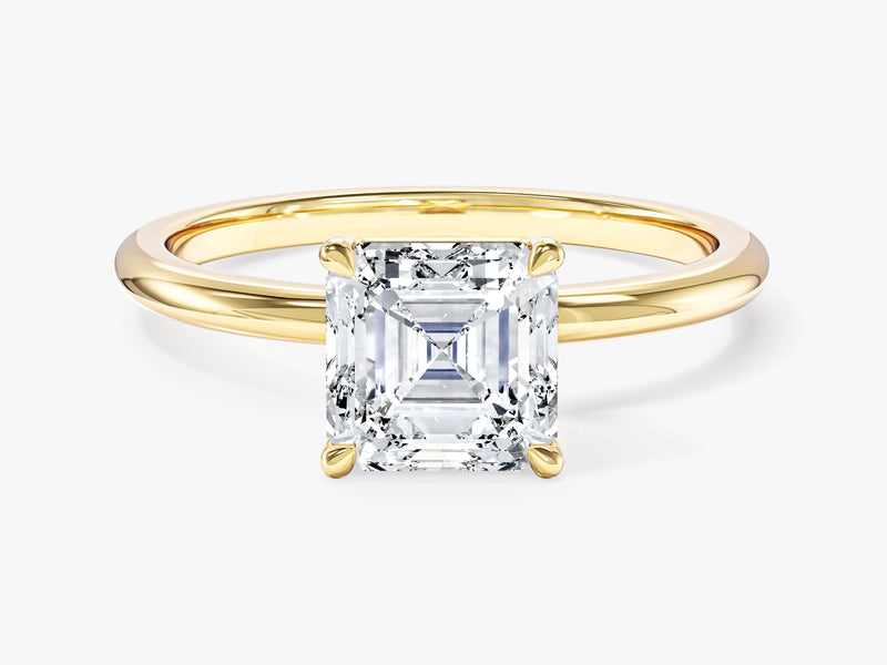Asscher cut diamond engagement ring in yellow gold