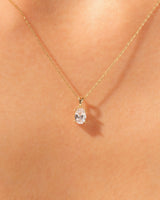 Gold necklace with oval diamond pendant, fine jewelry