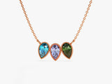 Rose gold necklace with three pear-shaped gemstones