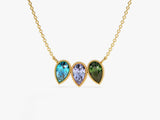 Gold necklace with three pear-shaped gemstone pendants