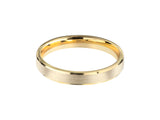 Gold wedding band with brushed finish and polished edges