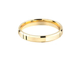 Gold wedding band with faceted edges, jewelry firm product
