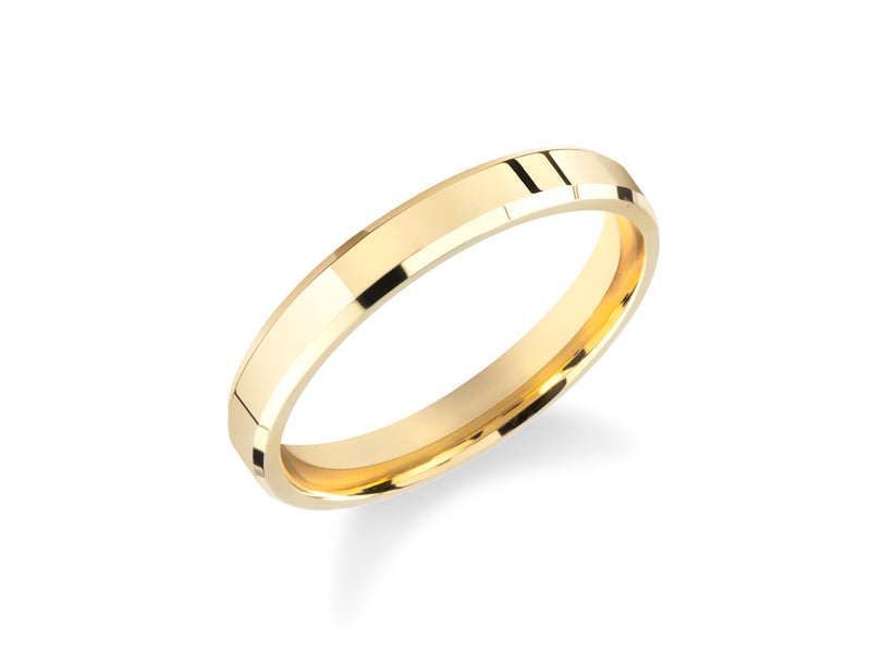 Gold wedding band with beveled edges and polished finish