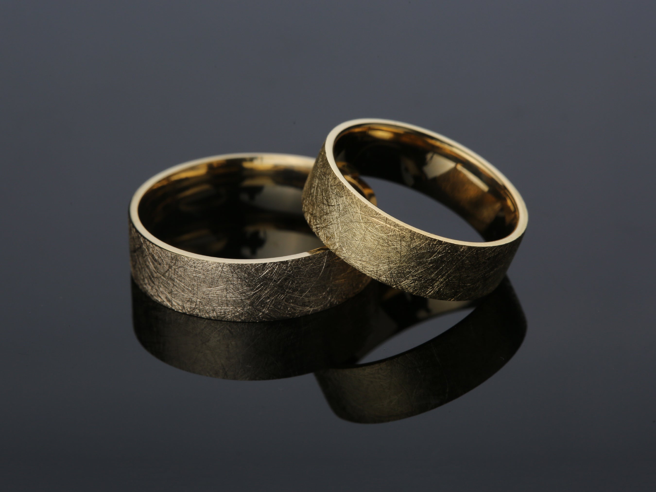 Textured gold wedding bands from a jewelry company